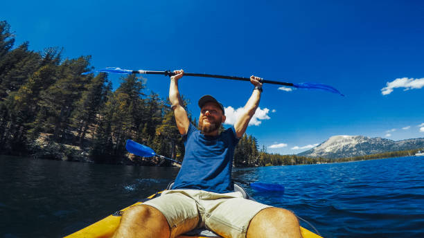 istock Summer travel in USA: POV kayaking in lake recreational area 1325897006