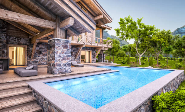 istock 3d rendering of modern cozy chalet in evening 1325900545