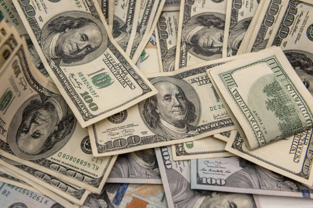 istock business background with us dollar bills, financial concept 1325902191