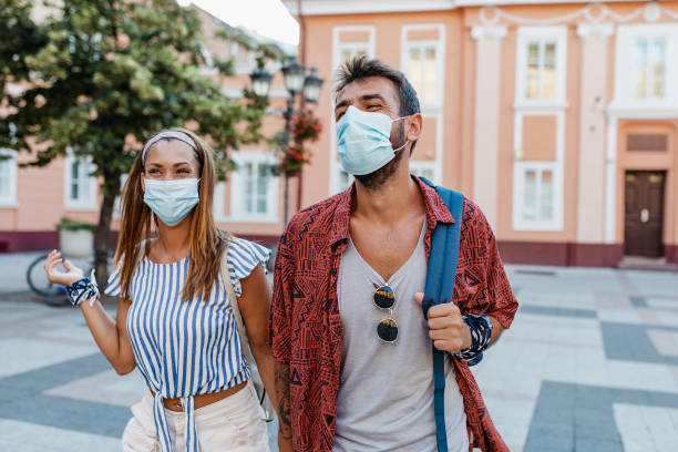 istock Tourism and exploring new cities while wearing face masks 1325908511