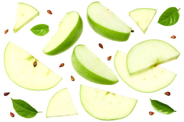 istock green apple with slices isolated on a white background. top view. clipping path 1325908650