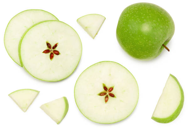 istock green apple with slices isolated on a white background. top view. clipping path 1325908712