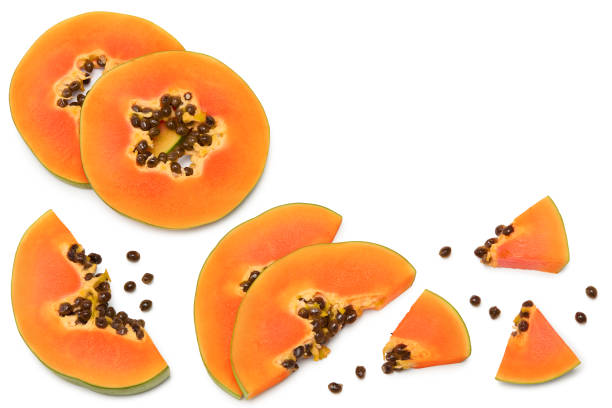 istock sliced ripe papaya fruit isolated on white background. exotic fruit. clipping path. top view 1325908726