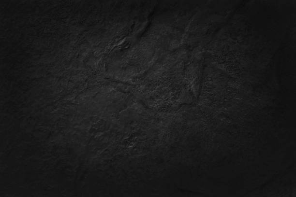 istock Dark grey black slate texture in natural pattern with high resolution for background and design art work. Black stone wall. 1325911626