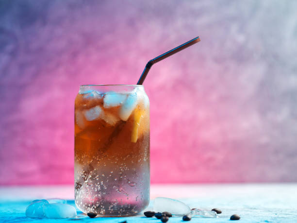 istock Trendy summer refreshing drink espresso tonic on a colored backlit background 1325913125