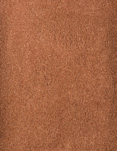 istock powdered brown rice husks or rice hulls, background, texture 1325913473
