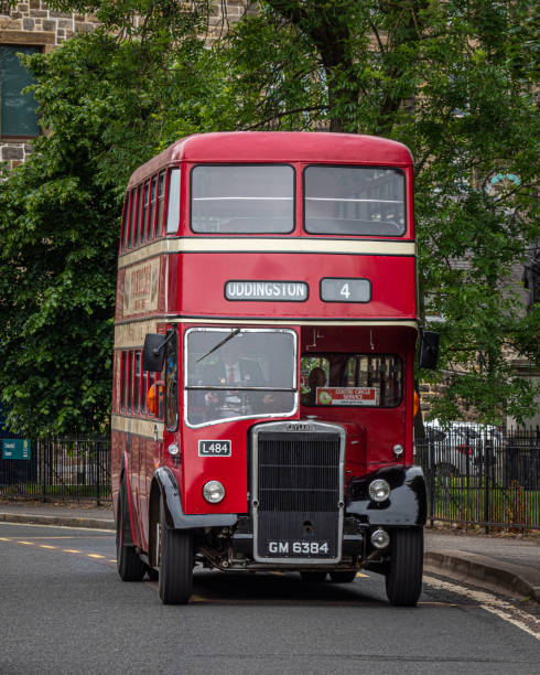 Glasgow, Scotland, UK. 26th June, 2021. Glasgow Vintage Vehicle Trust showcase their collection of vintage buses around the streets of Glasgow as part of their 'Centre Circle Day'