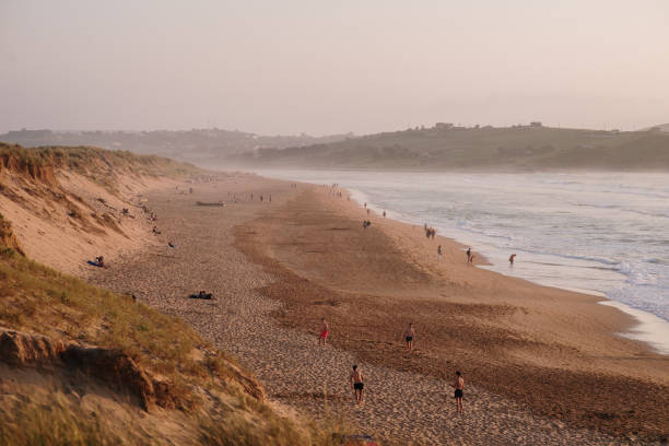 Sunset over Valdearenas Beach in Liencres, Cantabria, Spain. This beach is an important tourist destination in Cantabria, and is especially appreciated by surfers