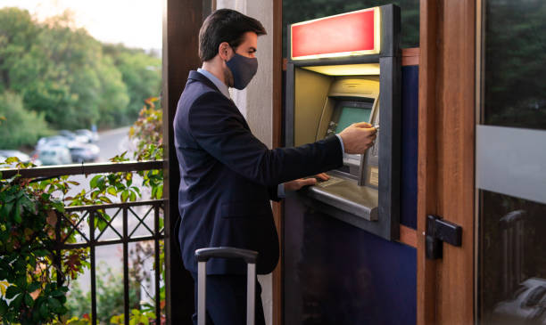 istock Customer cash withdrawals from an ATM machine 1325917066