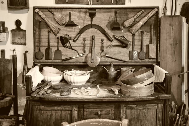 istock vintage photo of kitchen tools (pots, vases, jugs, etc.) and various containers 1325919805