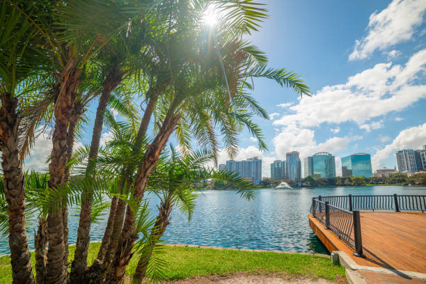 istock Sun shining over beautiful Lake Eola park in Orlando 1325920124