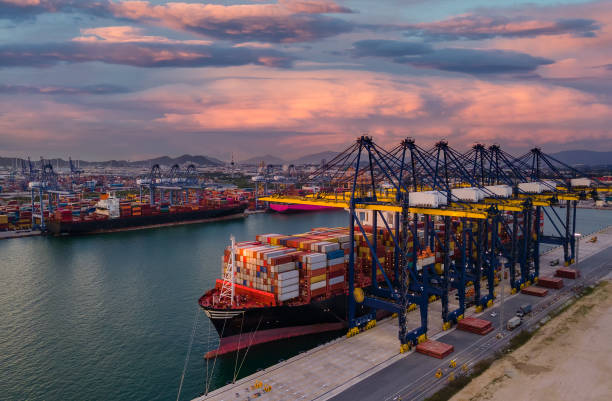 istock Container ship in export and import business and logistics. 1325920151