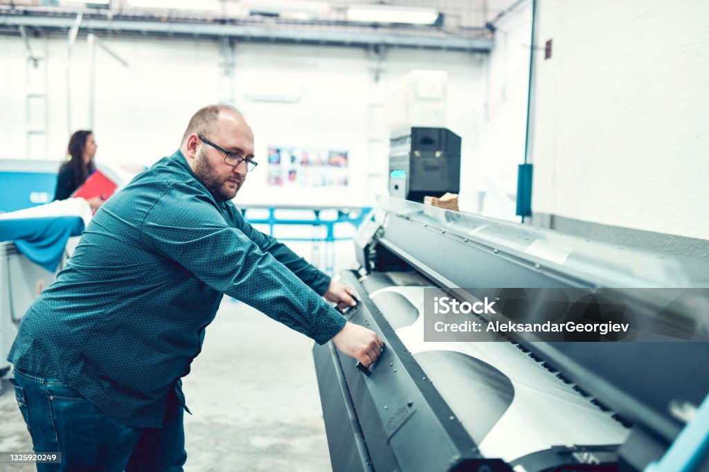 Problem Setting Up Machine Professional Worker Setting Up Machine In Textile Factory Stock Photo ...