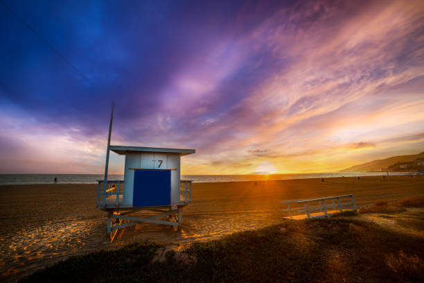 Lifeguard tower in Malibu shore at sunset. Los Angeles, USAColorful sunset in Malibu. Los Angeles, California