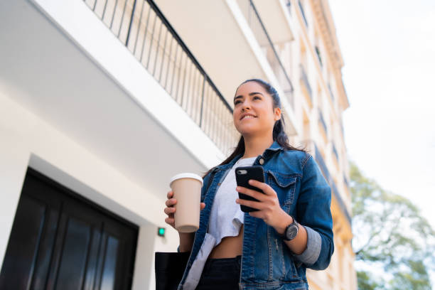 istock Young woman using her mobile phone. 1325921281