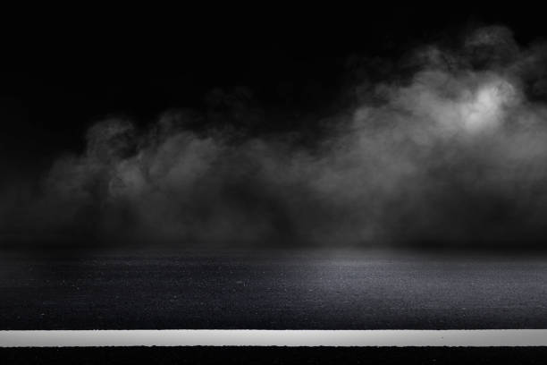 istock asphalt road and dark sky background 1325921364