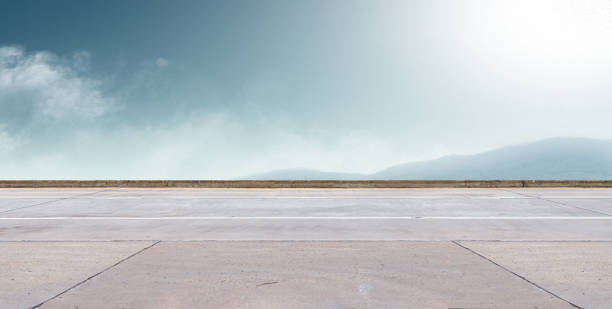 istock asphalt road and sky background 1325921411