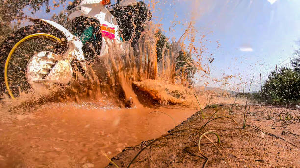 istock Adventure bike passing over a puddle 1325921872