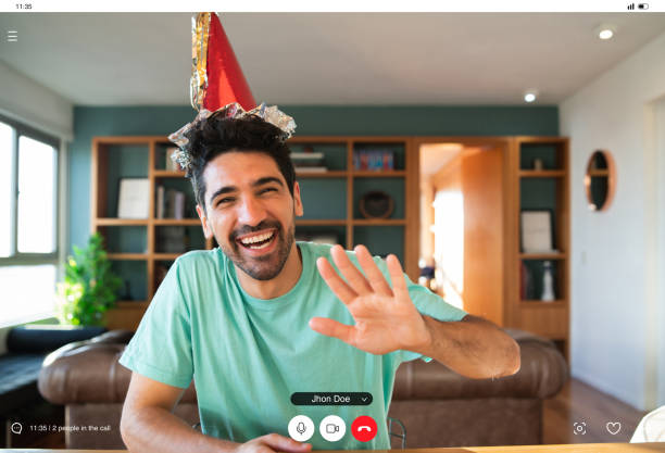 istock Man celebrating his birthday on a video call. 1325921878