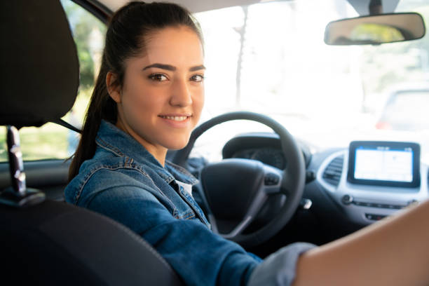 istock Woman driving her car. 1325922354