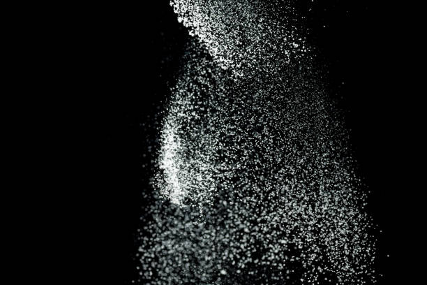 istock White powder explosion. White powder splash isolated on black background. Flour sifting on a dark background. Explosive powder 1325924571