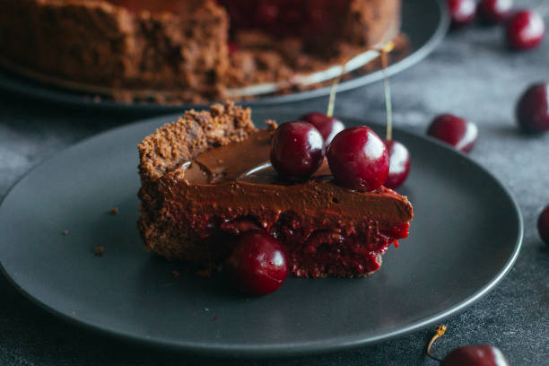 istock Pie with chocolate and cherries. Delicious cake on a plate 1325927764