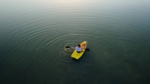 istock Best friends kayaking on the lake 1325927790