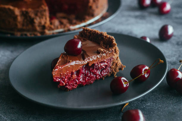 istock Pie with chocolate and cherries. Delicious cake on a plate 1325927793