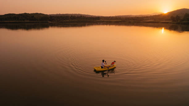 Best friends kayaking on the lake