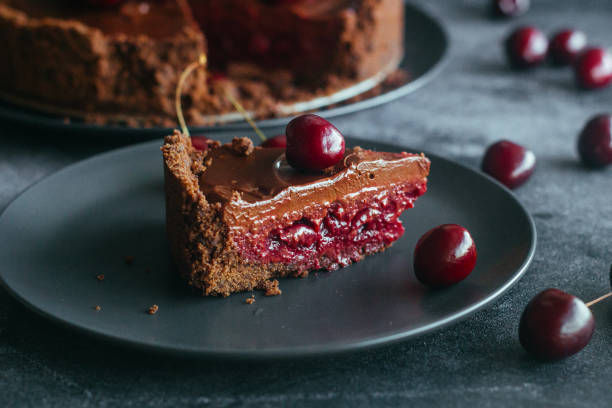 istock Pie with chocolate and cherries. Delicious cake on a plate 1325927815