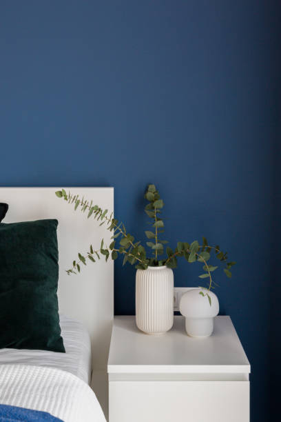 istock Close-up on white nightstand with decorations 1325928550