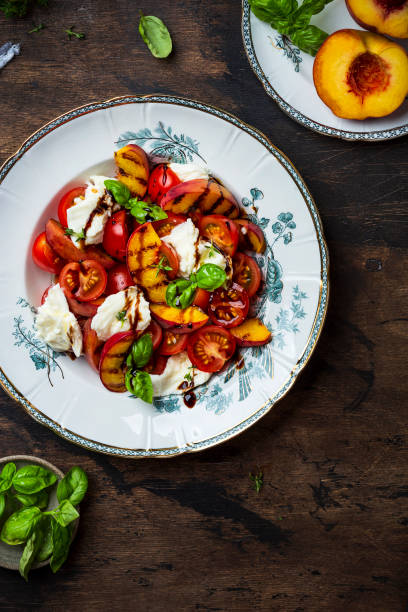 istock Grilled peach salad with mozzarella and tomatoes 1325929088