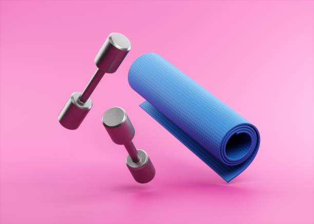 Flying dumbbells and yoga mat Flying dumbbells and yoga mat mat stock pictures, royalty-free photos & images