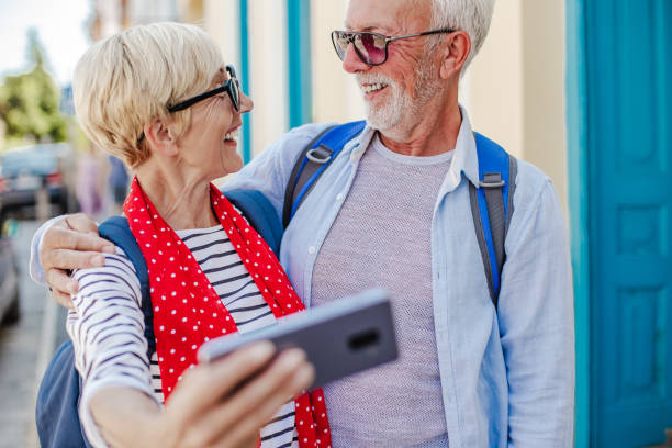 istock Senior couple on a city break taking a selfie 1325935053