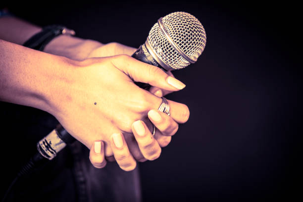 istock Close Up Microphone In Hands At Amsterdam The Netherlands 1325936743