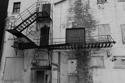 Chicago, Il, USA, June 12, 2021: fire escape ladder on an old building in Chicago, Il, USA