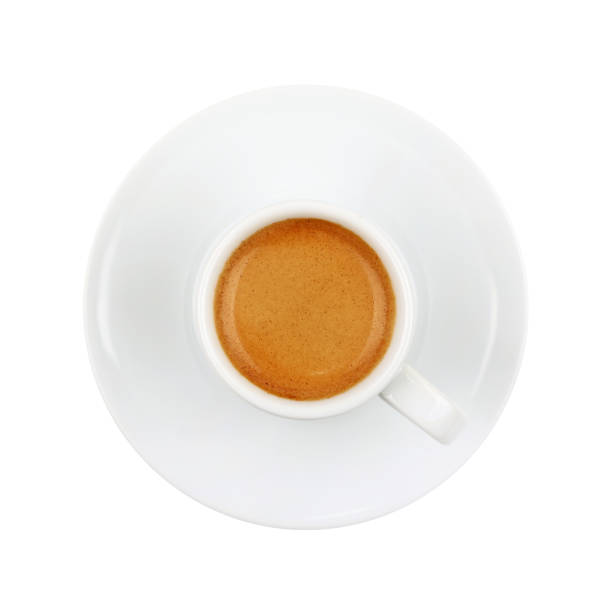 istock Full white espresso coffee cup on saucer isolated 1325941573