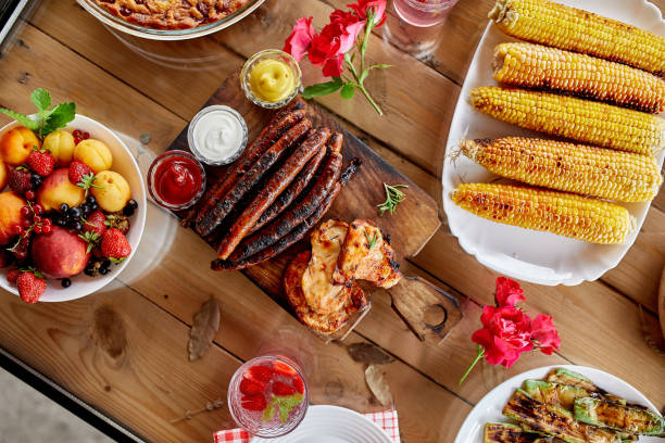 istock Dinner table appetizers variety serving on party outdoor table at home. 1325942115