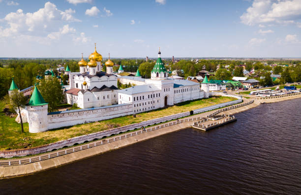 View of male Ipatiev Monastery on bank of river in Russian city of Kostroma on sunny spring day