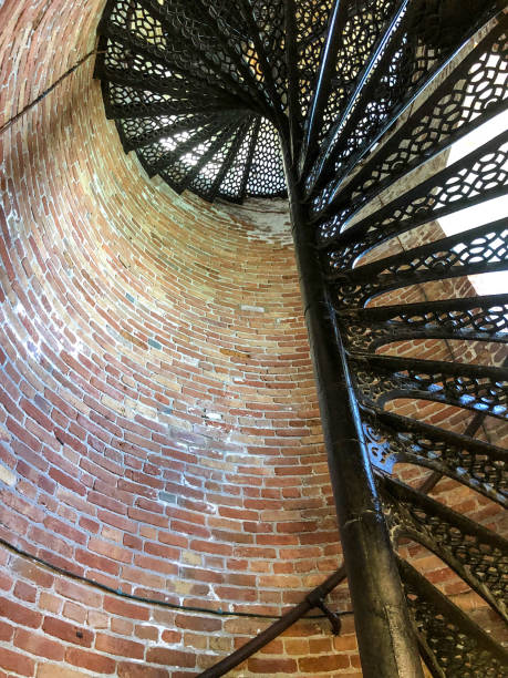 istock Black metal spiral stairs in lighthouse 1325946323
