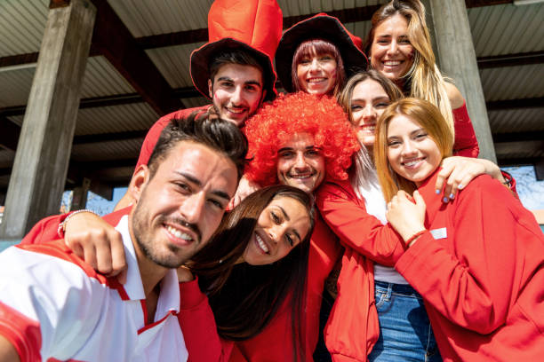 istock Supporters are taking a selfie together at the stadium 1325948647