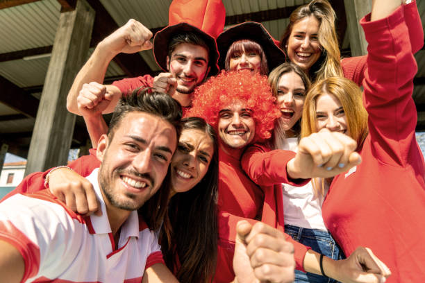 istock Supporters are taking a selfie together at the stadium 1325948648