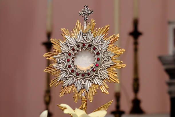 Shot taken in the Church of the Sacred Heart of Jesus in Chiaravalle (Catanzaro, Calabria, Italy). The Host bears the inscription JHS, monogram of the name of Jesus.