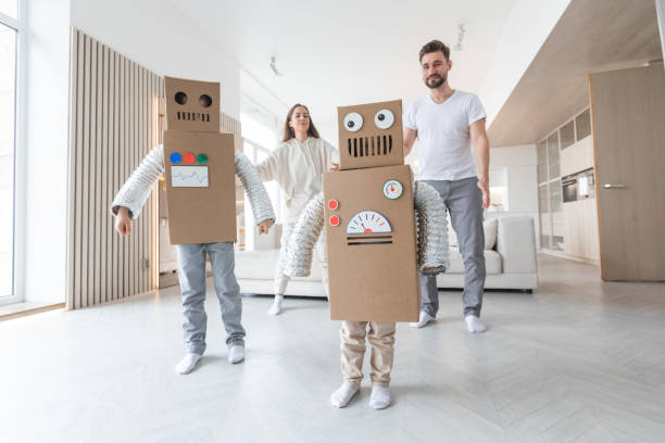 istock Family playing robots at home 1325951494