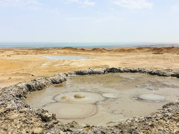 istock Active mud volcanoes in Gobustan desert, Azerbaijan. 1325952847