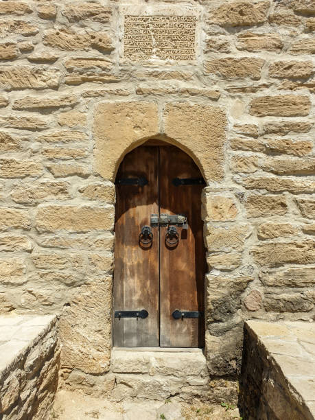 Antique wooden door in the old city in Baku, Azerbaijan. stock photo