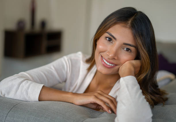 istock Beautiful woman relaxing at home 1325953699