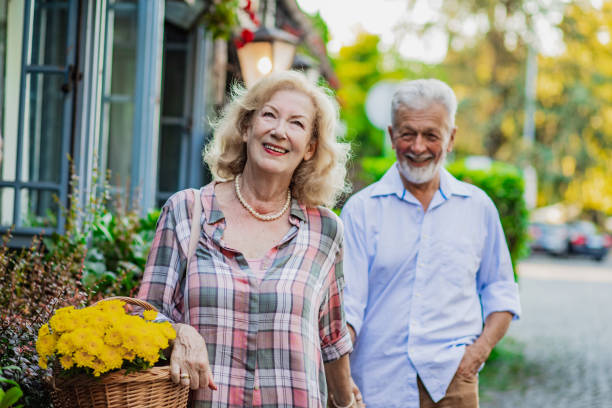 istock Happy senior couple are walking together 1325953861