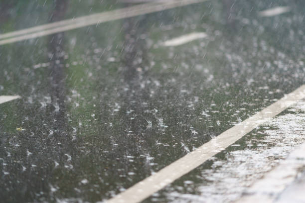 istock Rain flow on the road in the public park 1325960364