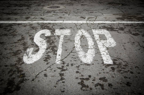 istock Stop sign on the asphalt 1325960952
